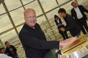 Trying the handprink in Bayterek tower